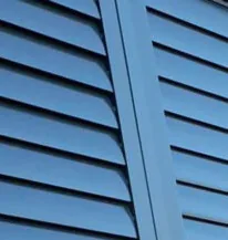 Blue aluminium shutter blades close-up