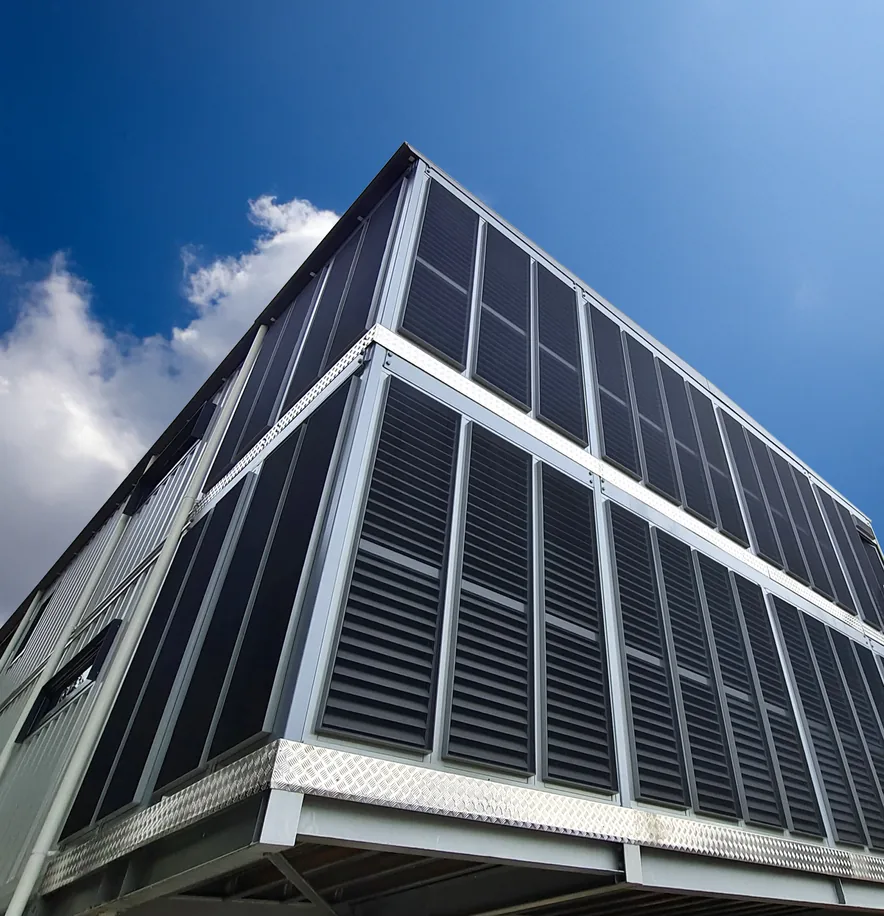 Fixed blade louvres on a two-storey building