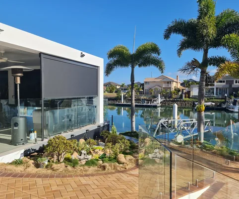 Outdoor blinds on a waterfront patio