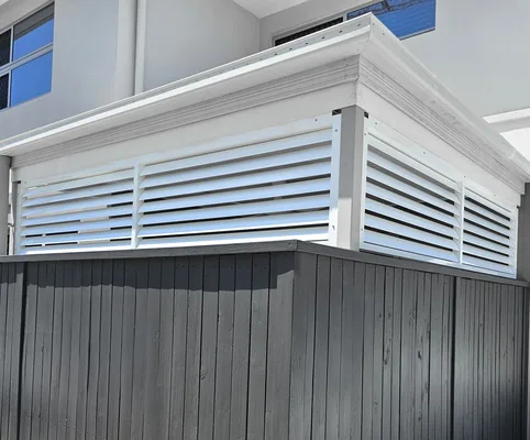 White louvres above a timber wall