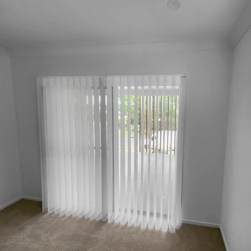Sheer curtains installed across sliding doors in Birkdale