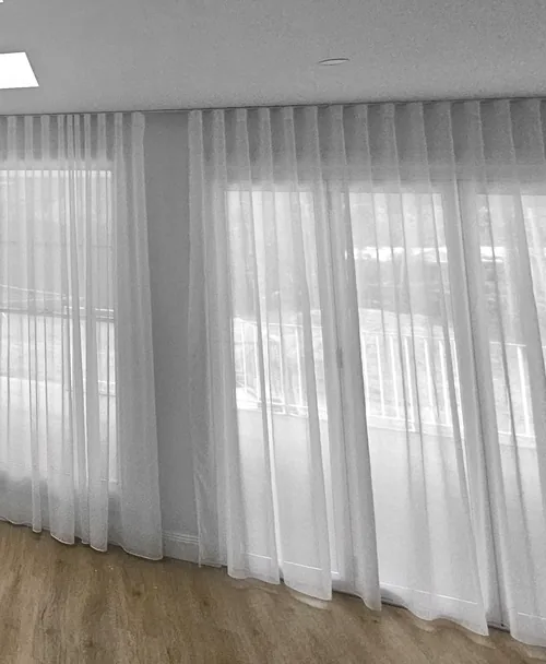 Sheer curtains in a bright living room