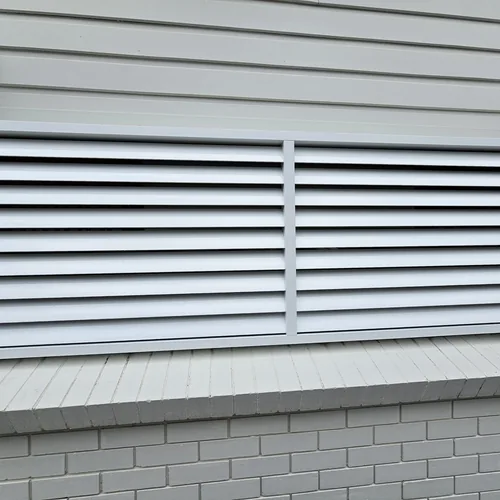 Fixed blade louvres on a house in Capalaba