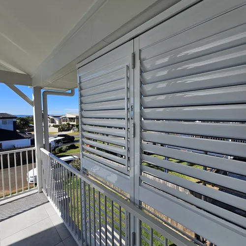 Outdoor aluminium shutters on a balcony in Redland Bay