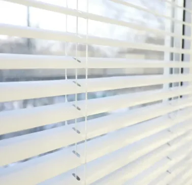 White Venetian blind slats close-up