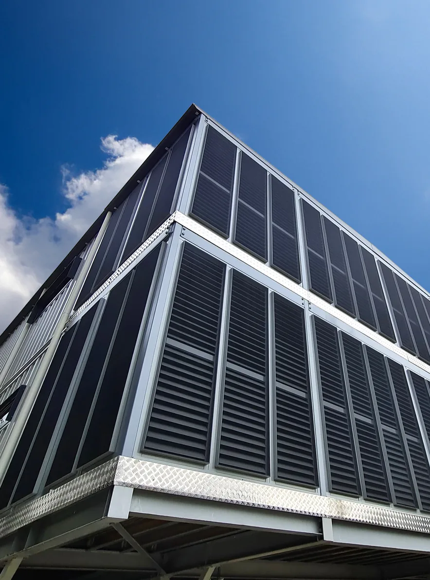 Fixed blade louvres on a two-storey building