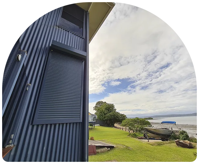 Roller shutter on a window of a coastal home