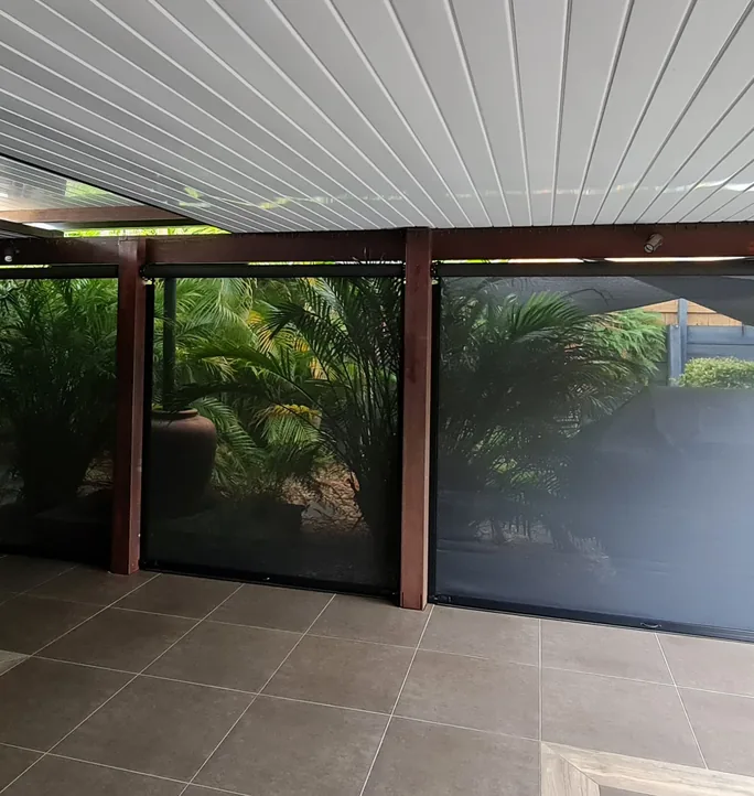Straight drop outdoor blinds around a pergola