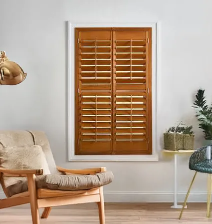 Stained timber plantation shutters on a window