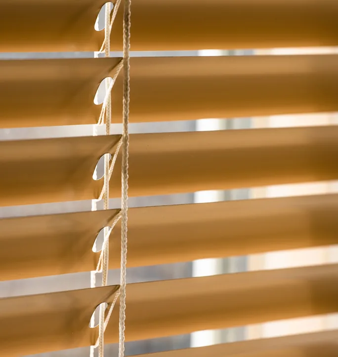 Timber-look Venetian blind slats close-up