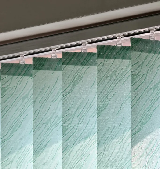 Fabric vertical blind blades on the headrail