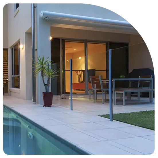 Xceed security screens on a home beside a pool