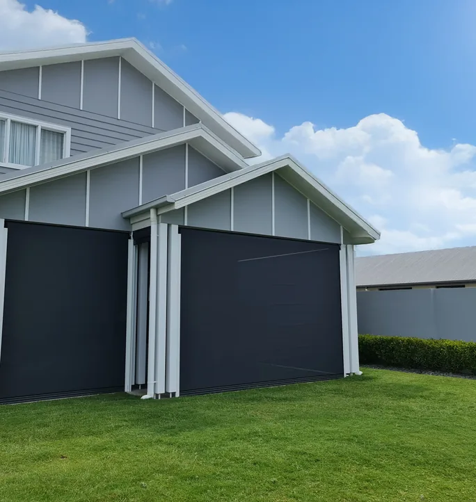 Zip screens on a garage-style opening