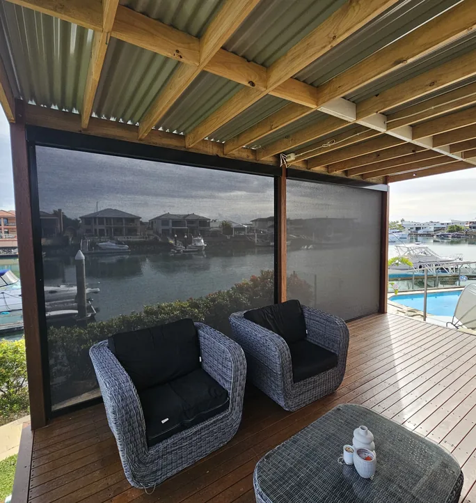 Zip screens around a covered deck by the water